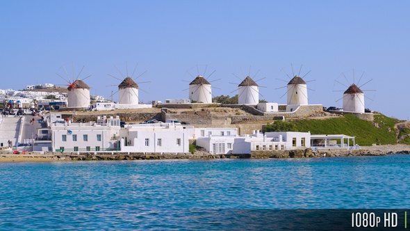 Traditional Greek Windmills on a Sunny Summer Day on the Greek Island of Mykonos alt