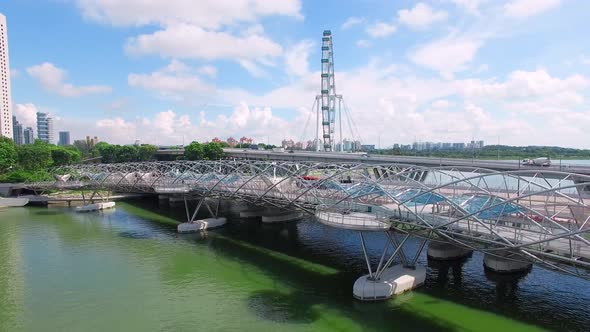 Aerial View of Helix Bridge, Singapore Flyer and Marina Bay. Singapore