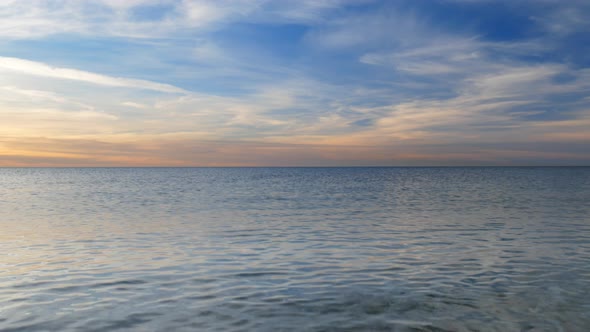 Sky and Sea Surfase at Sunset.