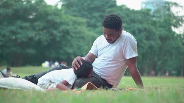 Dark Son And Dad, African American father and son playing in park, Happiness family concepts