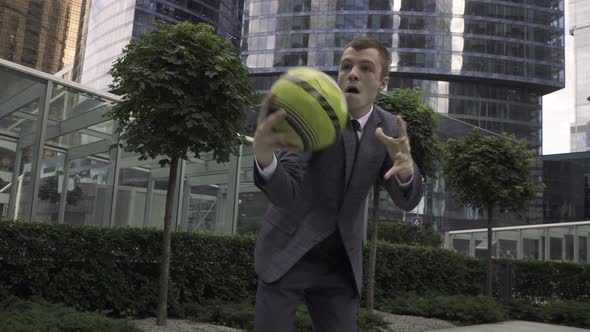 The Young Businessman Wearing Suit Quit His Office Job and Began to Play Basketball alt