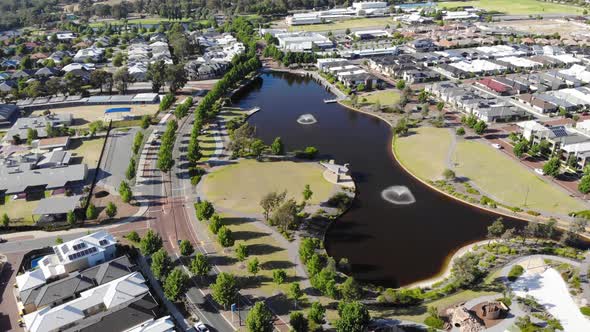 Aerial View of a Suburb with Lake alt