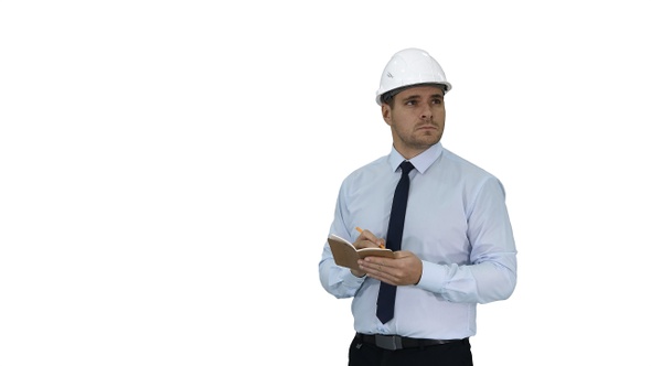 Man in helmet and formal clothes walking looking around alt