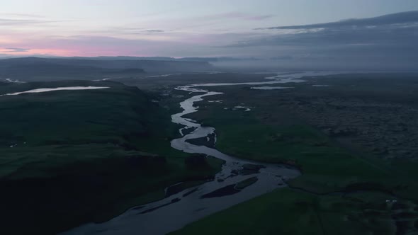 Aerial View of Throsmork National Park with Krossa River Flowing Riverbed at Sunset alt