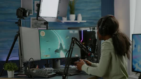 Black Woman Streamer Playing Space Shooter Videogames alt
