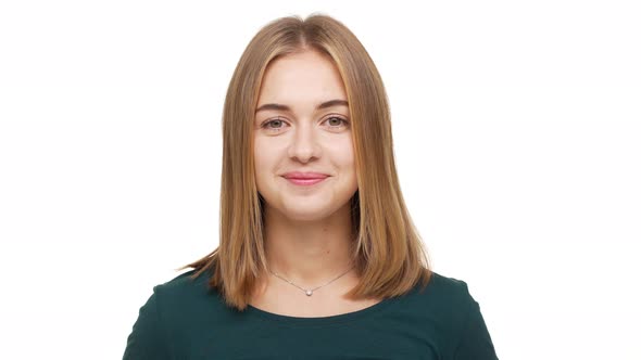 Portrait of Affable Lady Wearing Casual Expressing Agreement Nodding Positively Meaning Yes with alt