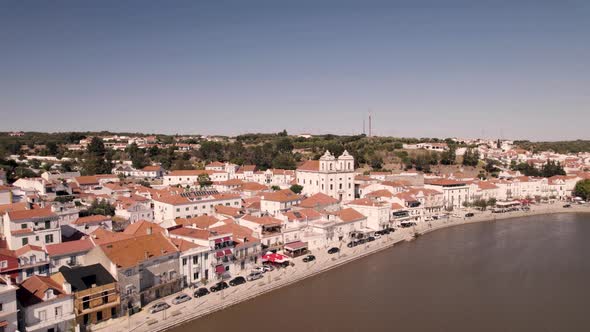 Alcaçer do Sal  promenade by Sado river, Alentejo, Portugal. Beautiful cityscape. Aerial view alt