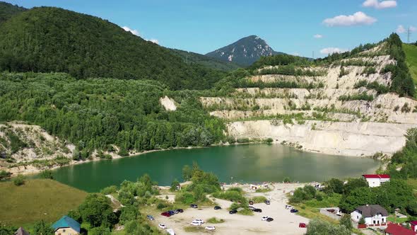 Aerial view of a lake in the village of Sutovo in Slovakia alt