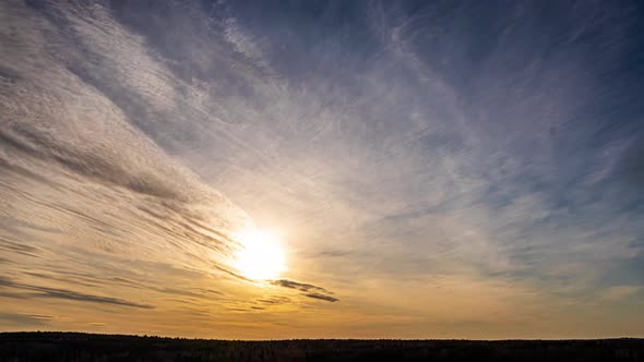Beautiful Evening Sunset, Time Lapse, Movement of Clouds of a Different Level Against the Setting alt