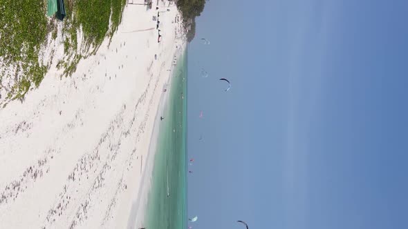 Vertical Video Boats in the Ocean Near the Coast of Zanzibar Tanzania Aerial View alt
