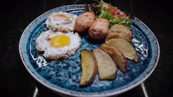 Fried Eggs with Sausages Toast and Vegetables