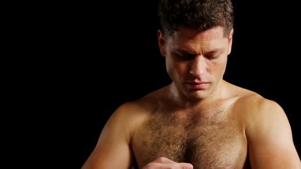 Boxer wearing boxing gloves alt