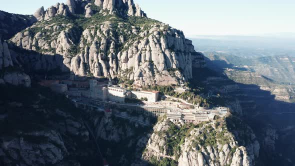Panorama of famous mountain range of Spain: popular historical sightseeing in gorge at sunny day