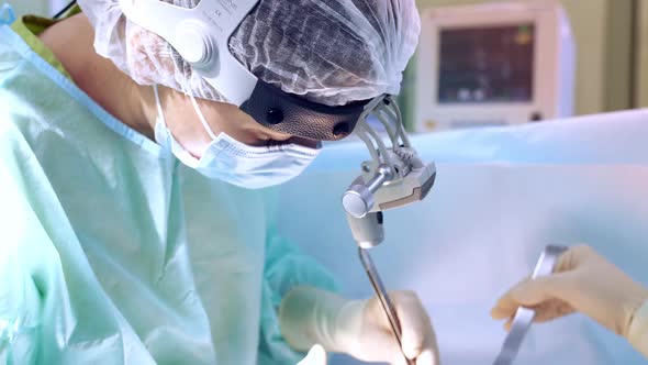 the Surgeon Performs a Surgical Operation