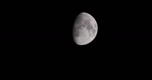 Waxing Gibbous Three Quarter Moon In Black Night Sky 4K alt