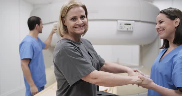 Portrait Of Happy Senior Woman Smiling As Patient In Hospital