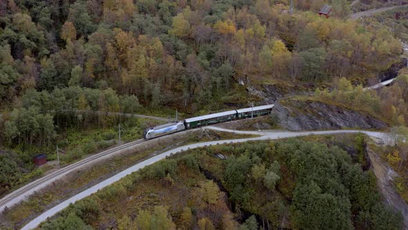 The Flam to Myrdal Train Passing Through Beautiful Landscapes alt