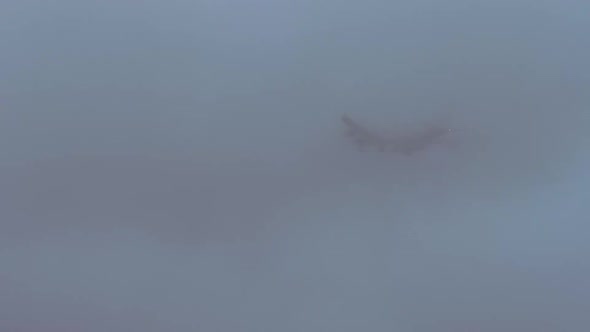 The Plane Flies Through the Cloud alt