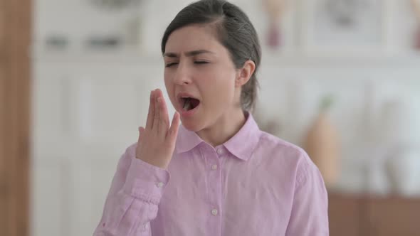 Portrait of Sleepy Indian Woman Yawning alt
