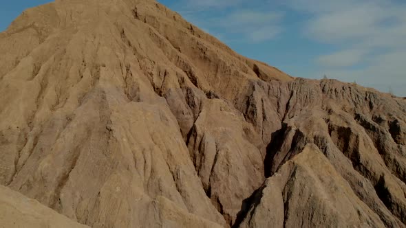 Close-up Shooting of Sandy, Desert Mountains and Rocks in Nature. alt