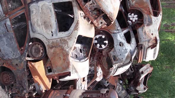 Vertical Video of Wardestroyed Cars in Irpin Ukraine alt