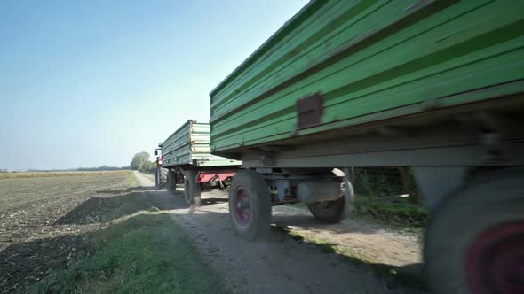Tractor With Trailers on Country Road