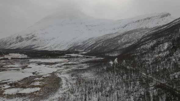 Snowy Mountain Scenery Of Signaldalen In Northern Norway In Winter - aerial shot alt