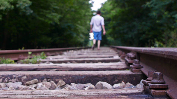 Man Walking On Railroad 3