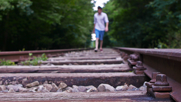 Man Walking on Railroad 4