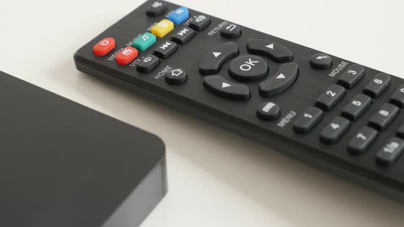 Smart TV box  and IR controller 4K 2160p 30fps UltraHD tilting video - Audio and video media player  alt