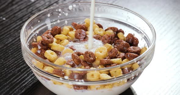Breakfast Chocolate Corn Cereal in a Bowl with Milk alt