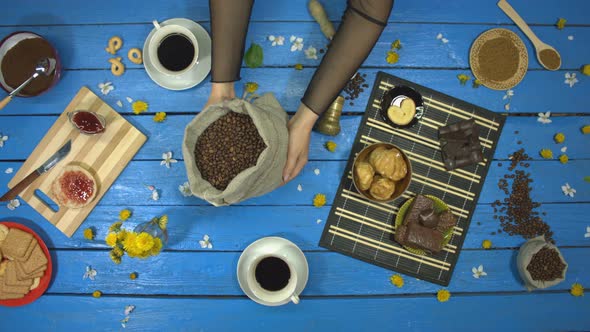 Coffee and Dessert on Blue Wooden Table