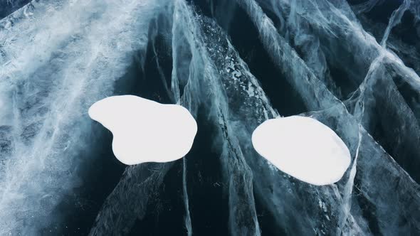 Cracks in Transparent Blue Ice of Baikal Lake Dolly Motion Close Up View
