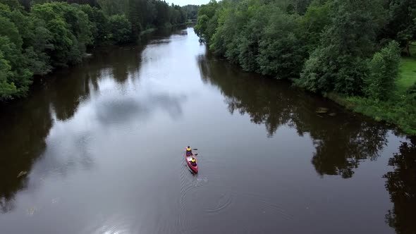 Aerial View of the Men Inside the Canoe in Estonia