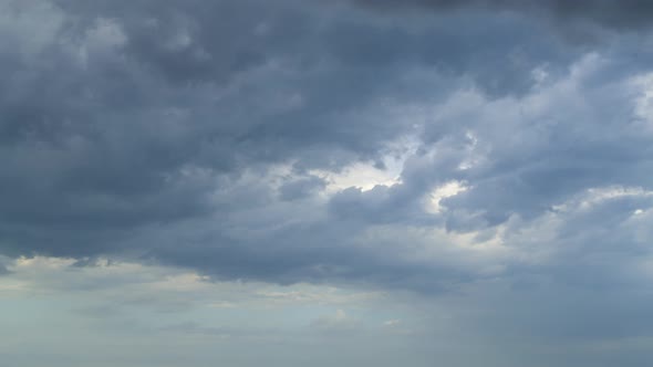 Thundercloud Moves Across a Cloudy Sky