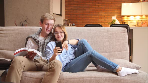 Young Loving Couple Having Fun at Home.