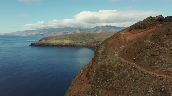 Climber on Madeira Sao Laurenco mountain. Aerial view, adventure concept alt