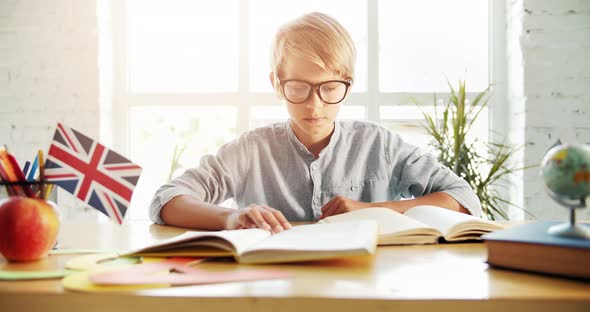 Boy Reading English Book Sunset