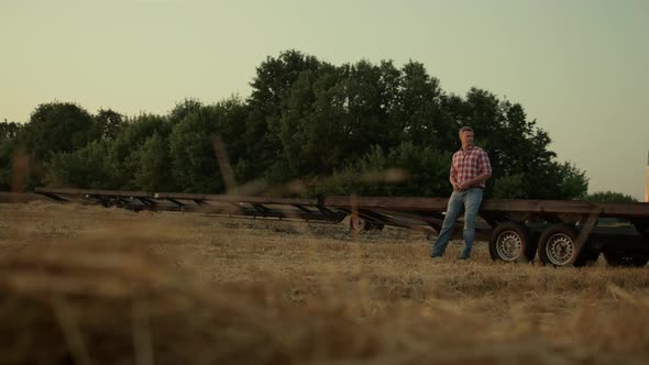 Farmer Work Wheat Field at Machine Rural Area View alt