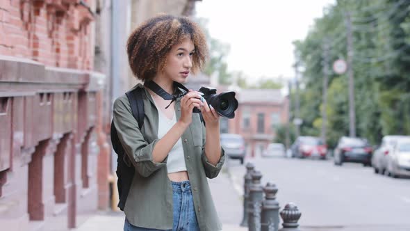 Stylish Attractive Curly African American Black Woman Walking Street and Exploring Sightseeing with alt