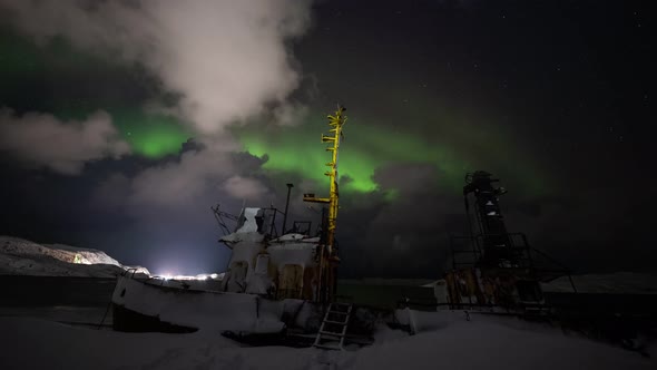 Scenic Time Lapse of Aurora Borealis Above Abandoned Ship