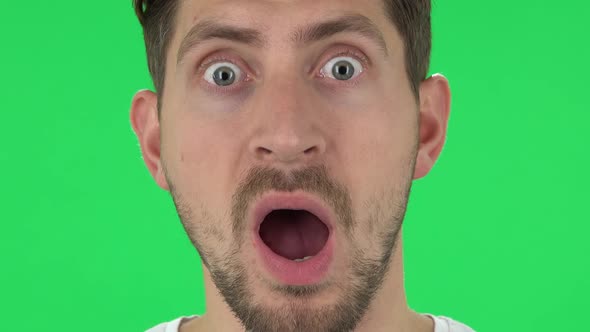 Man with a Beard Is Looking Straight and Scared alt