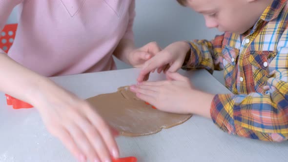 Mom Son Are Making Christmas Gingerbread Cookies Cutting It From Dough