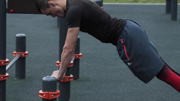 Man training outdoors on sports field