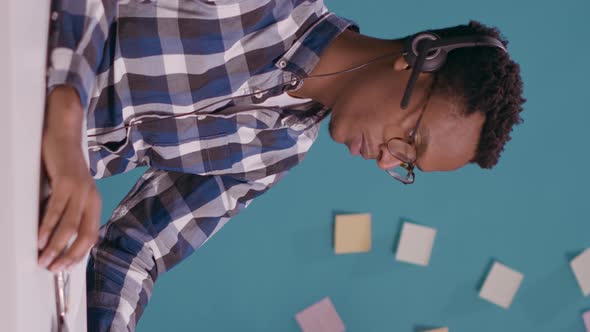 Vertical Video Helpline Operator Giving Telemarketing Assistance and Support alt