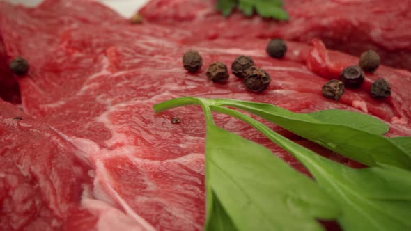 Raw Beef Steak with Spice and Seasoning Close Up alt