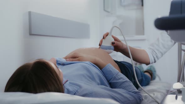 Doctor Video Footage - A Pregnant Woman Undergoing Ultrasound Procedure alt