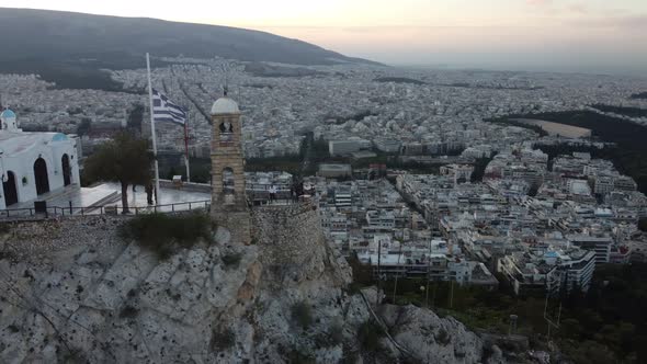Drone Flying Around the Cliff From the Holy Church of Saint George in Athens