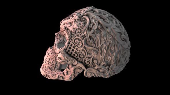 Carved ceramic skull with alpha