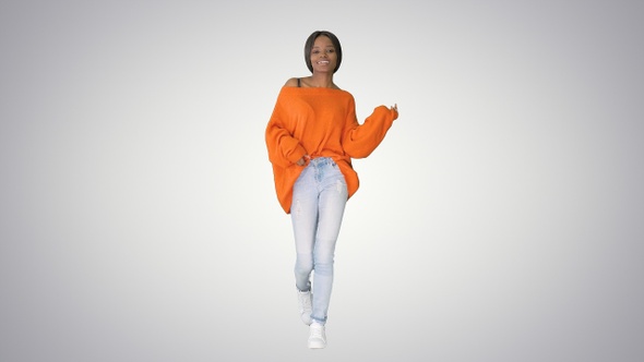 African American Girl Dancing Walking on Gradient Background alt